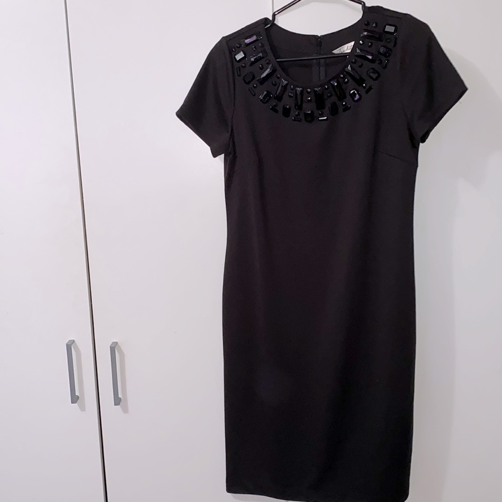 BNWOT black dress with diamond neckline
